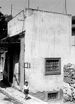 Το σπίτι του Αγίου Μιχαήλ του Πακνανά στην παλιά αθηναϊκή συνοικία της Βλασσαρούς (φωτογραφία από το αρχείο της Αμερικανικής Σχολής Κλασσικών Σπουδών στην Αθήνα – 1935 μ.Χ.)